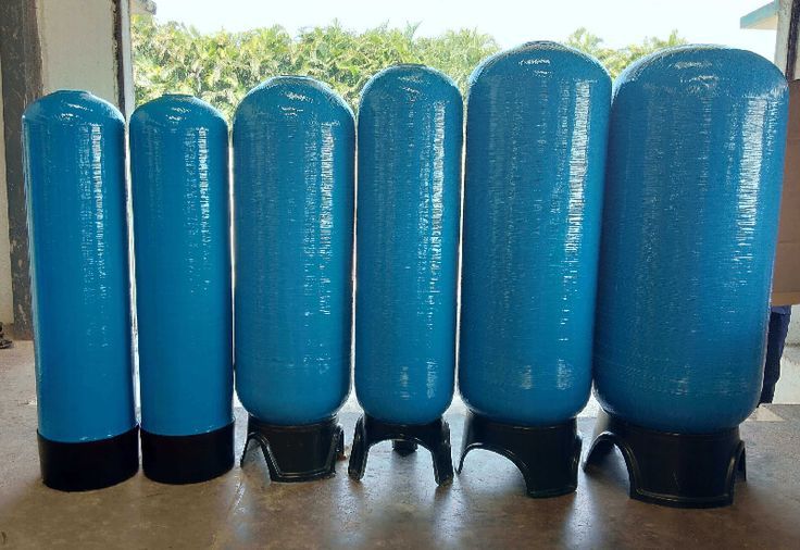 Technician installing FRP vessel